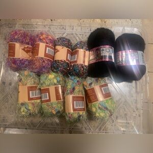10 skeins of Unused knitting yarn, Each is 50 grams/ 1.7 oz .